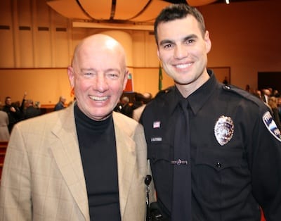 Joe Boyle (left) with Officer Michael Schlotterbeck.