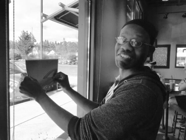 Jafari Simmons - Frequently seen tracing his artwork using Starbucks window.