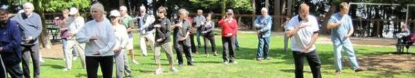 Members of the Empty Step Tai Chi Association take their Tai Chi form outdoors at Pt, Defiance Park. Organization Founders Gary Wessels and Steve Allen are far right.