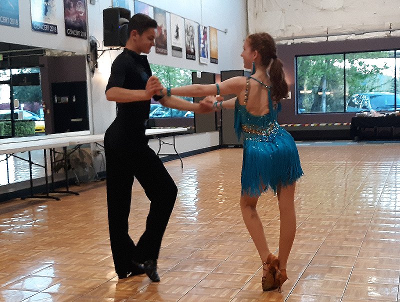 Junior High students Mercedes Mecham and Landon Heal perform a