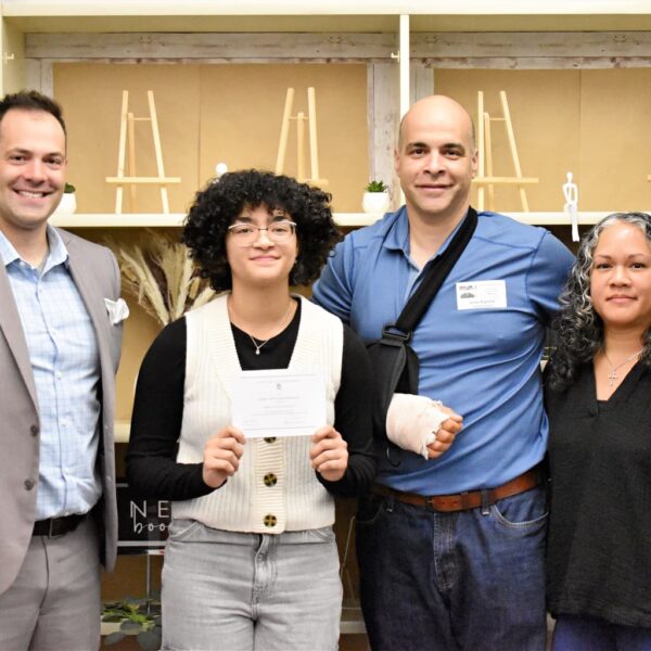 From left Jake Tyrrell (principal), Nora AgostoSungino, Jose Agosto